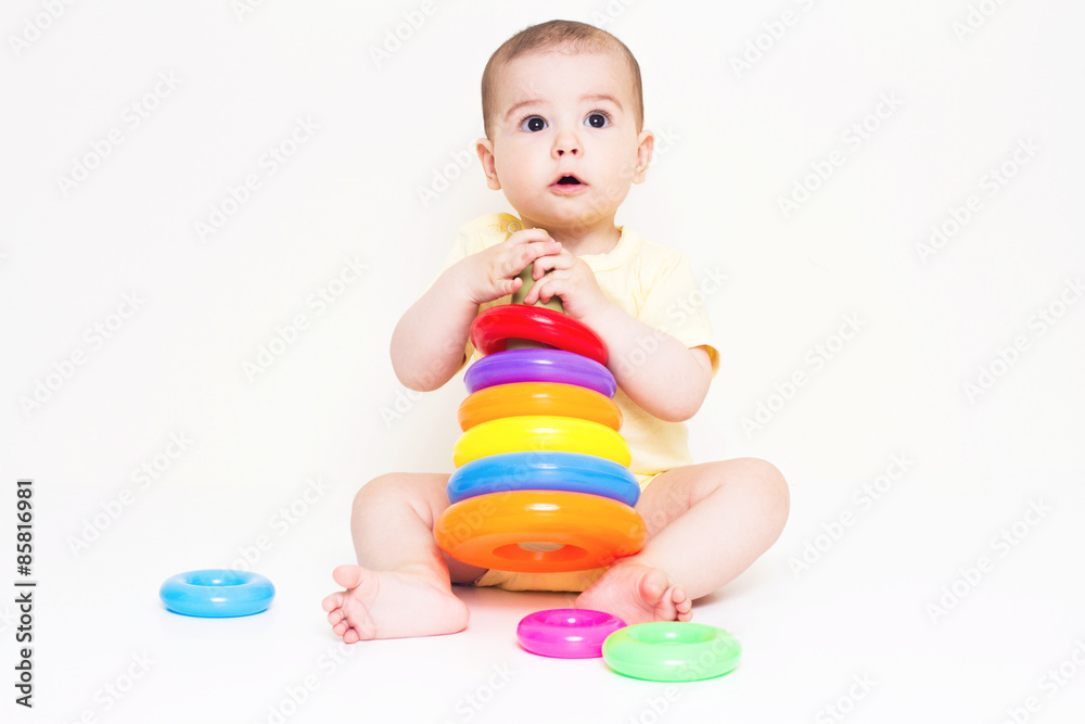 Beautiful baby playing with colorful toy
Beautiful baby playing with colorful toy