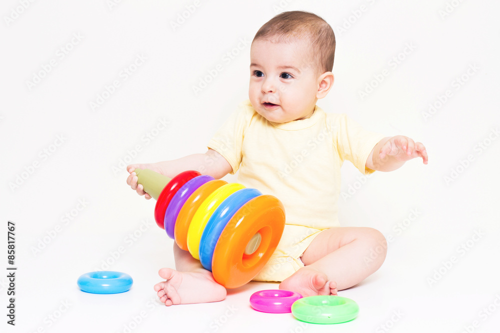 Beautiful baby playing with colorful toy
Beautiful baby playing with colorful toy