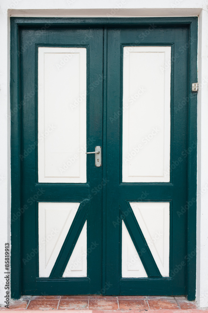 Green and white door