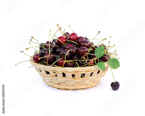 Cherry in bowl isolated on white background