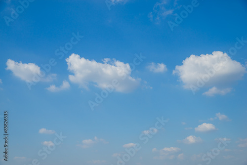 Blue sky and tiny clouds.