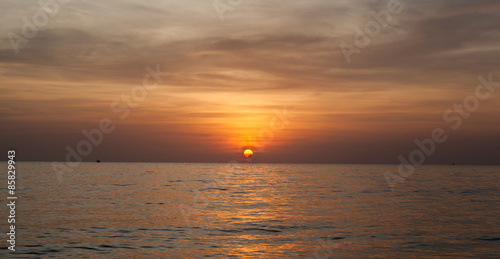 Scenic view of beautiful bright sunset above the sea © rasskaz
