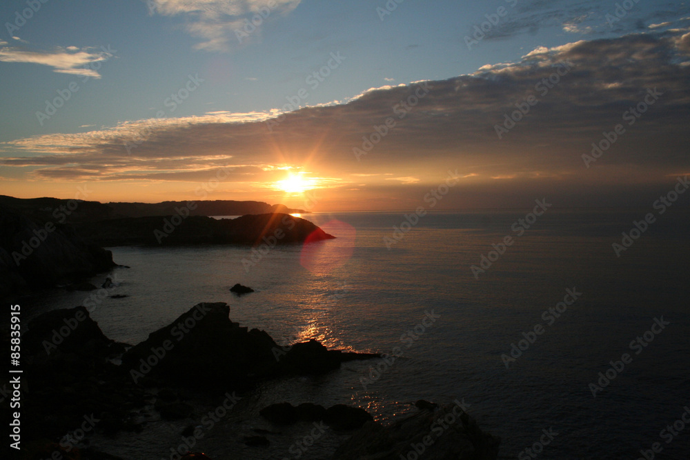 Obraz premium Puesta de Sol a Orillas del Mar