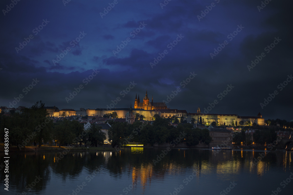View of the Charles Bridge and Castle in Prague at night.