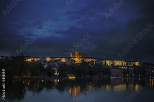 View of the Charles Bridge and Castle in Prague at night.