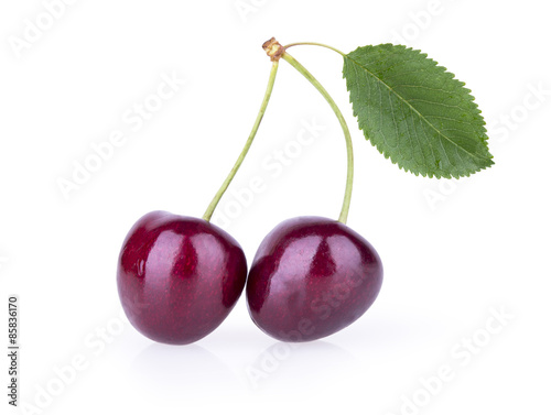 ripe red cherries with leaves isolated