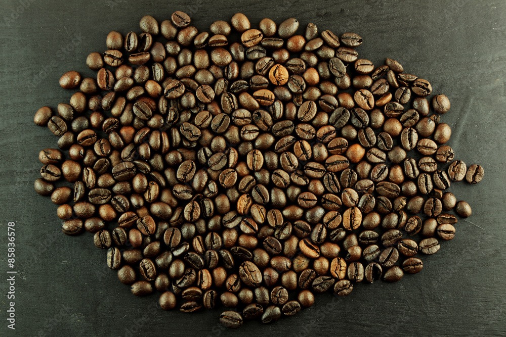 Coffee beans isolated  on wooden background
