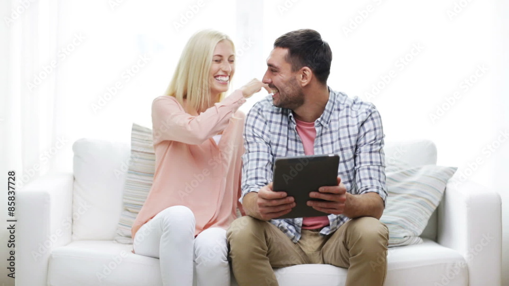 happy couple with tablet pc at home happy couple with tablet pc at home