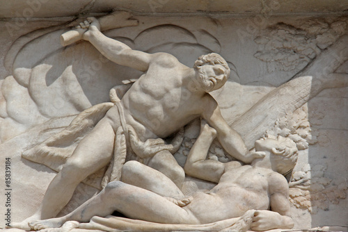 Caino uccide Abele; altorilievo in marmo, facciata del Duomo di Milano photo