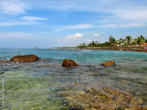 Fototapeta Naklejka Na Ścianę i Meble -  Ocean bay with rocks and transparent water, Sri-Lanka