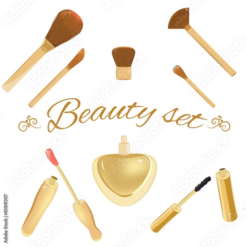 Set of cosmetic brushes, mascara, lipgloss and perfume bottle