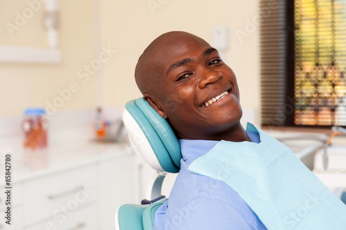 african man visiting dentist