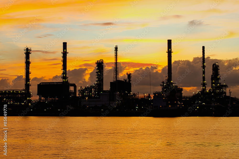 Oil refinery along the river at Dusk (Bangkok, Thailand)