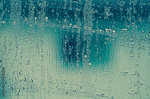 natural water drops on glass window