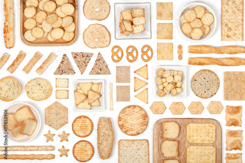crackers and snacks on white background