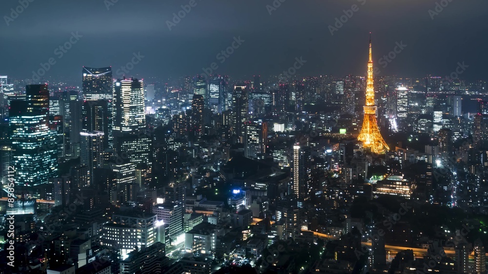 Time-lapse of Tokyo from above with Tokyo Tower in the background Time-lapse of Tokyo from above with Tokyo Tower in the background