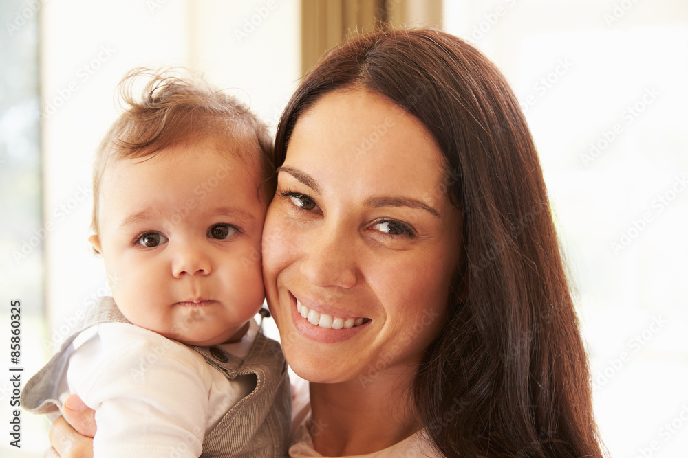 Mother Cuddling Happy Baby Boy At Home Mother Cuddling Happy Baby Boy At Home