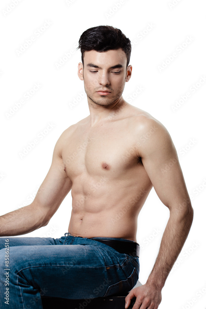 Healthy muscular young man. Isolated on white background Healthy muscular young man. Isolated on white background