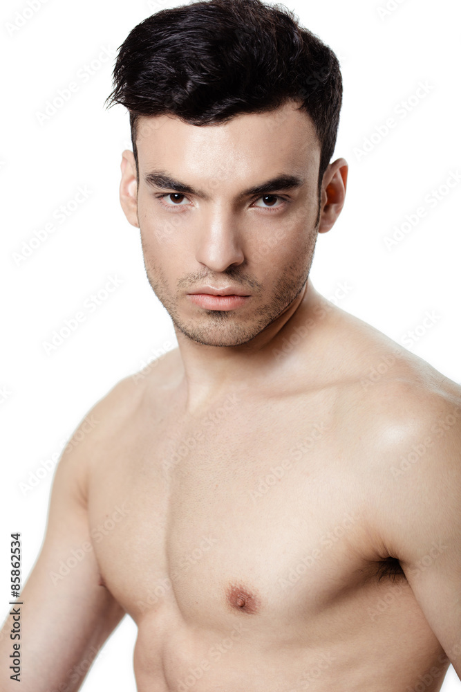 Healthy muscular young man. Isolated on white background Healthy muscular young man. Isolated on white background