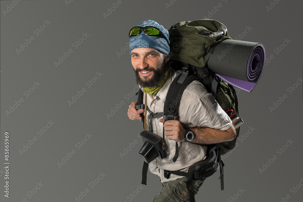 Portrait of a smiling male fully equipped tourist Portrait of a smiling male fully equipped tourist