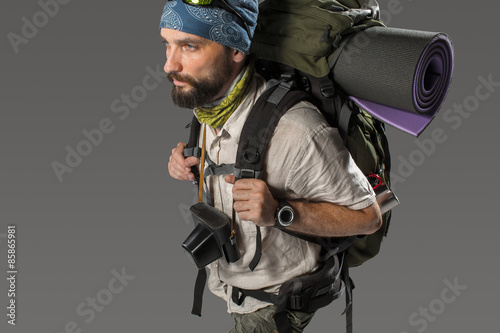 Portrait of a male fully equipped tourist 