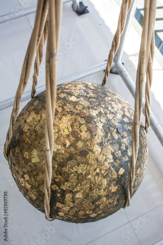 round stones buried in the ground to mark the sacred limits of a thai temple call 