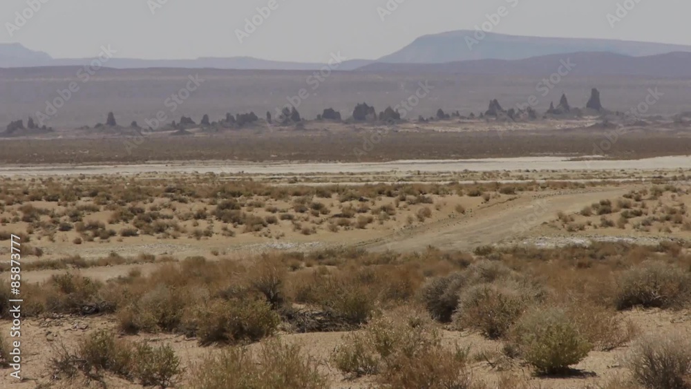 Hoodoo formation in distant desert landscape in Death Valley region in California. Hoodoo formation in distant desert landscape in Death Valley region in California.