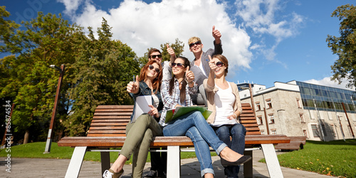 group of students or teenagers showing thumbs up