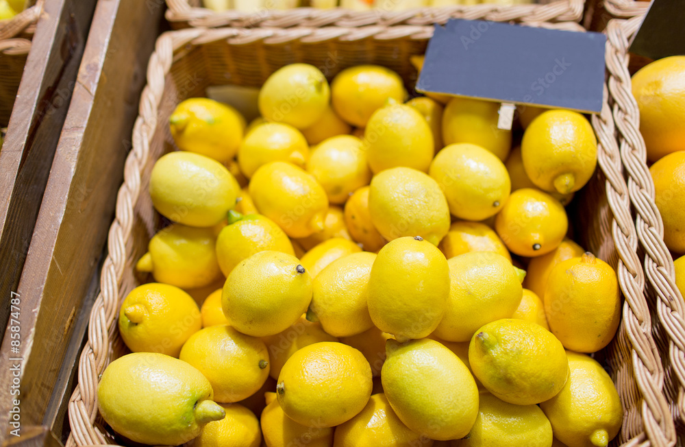 ripe lemons at food market