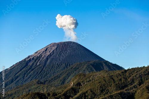 Ash cloud rising at Semeru Volcano Mountain, East Java, Indonesi