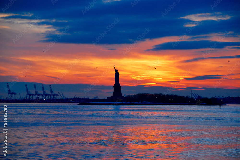 Statue of liberty in new york during sunset