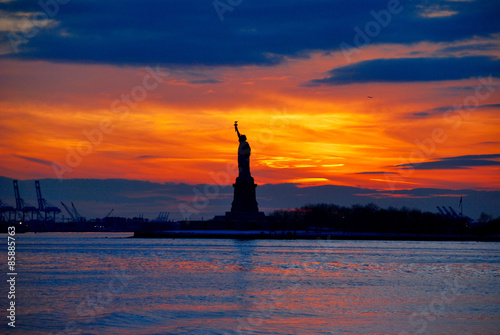 Statue of liberty in new york during sunset