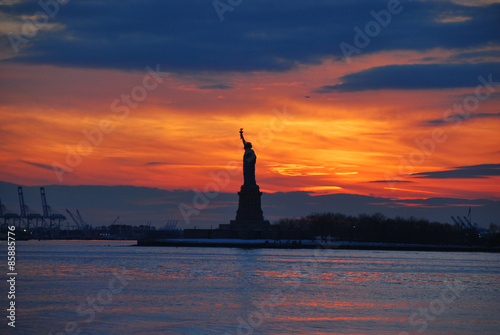 Statue of liberty in new york during sunset