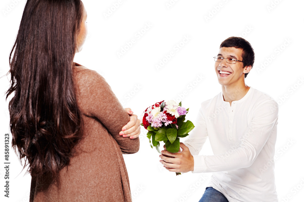 Guy gives flowers to girl Guy gives flowers to girl