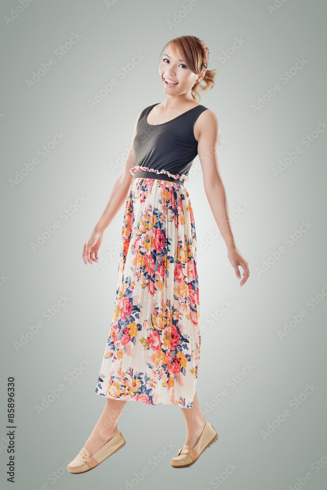 Fototapeta premium Attractive Asian woman with maxi dresses