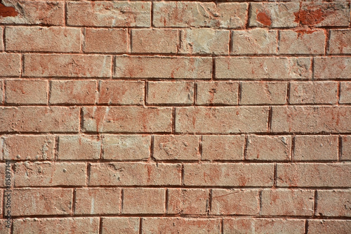 Ancient red brick wall as a background