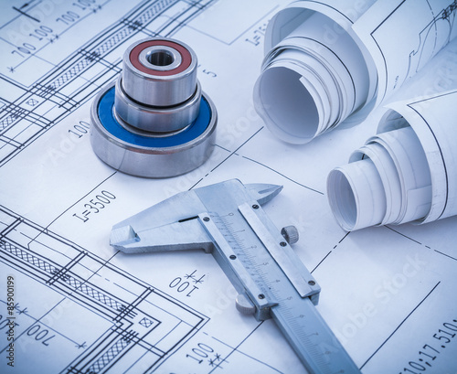 Construction drawings slide caliper roller bearings on blueprint