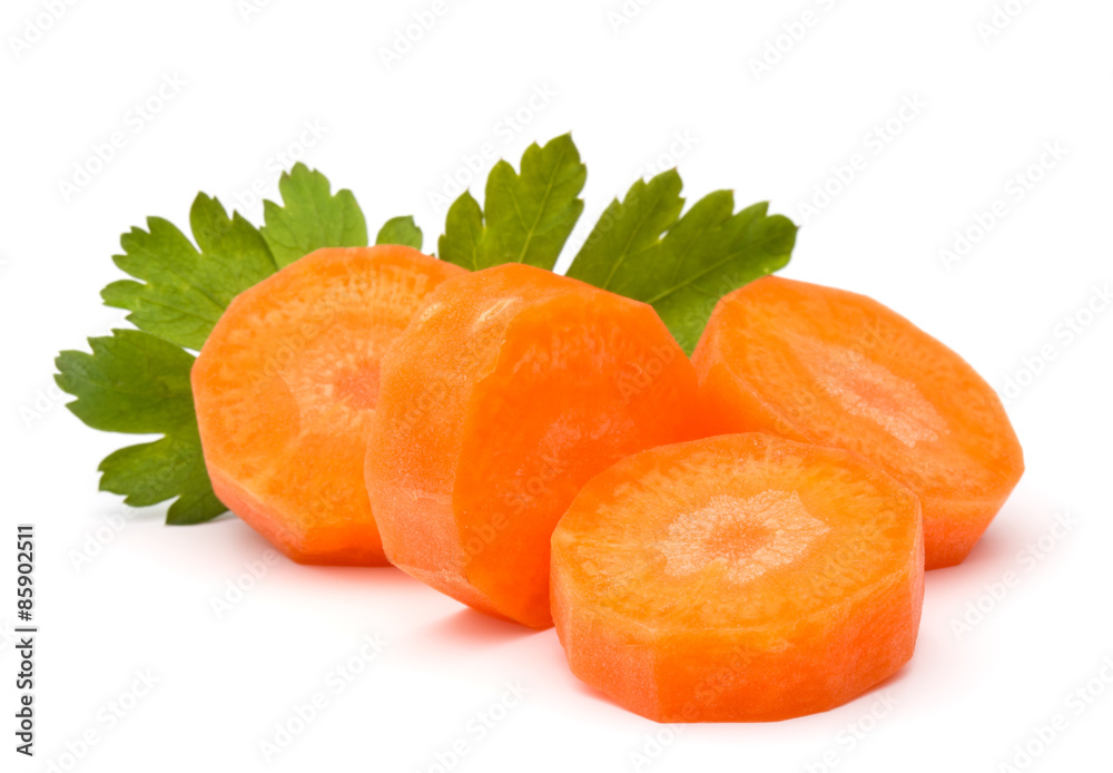 Chopped carrot slices and parsley herb leaves still life isolate Chopped carrot slices and parsley herb leaves still life isolate