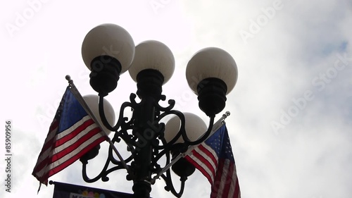 Time lapse footage of American Flag at Historic Lapm in Downtown San Diego photo