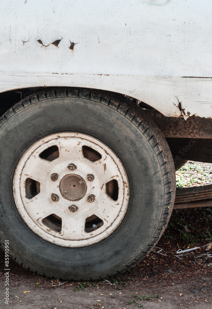 Wheels of old cars, old white.