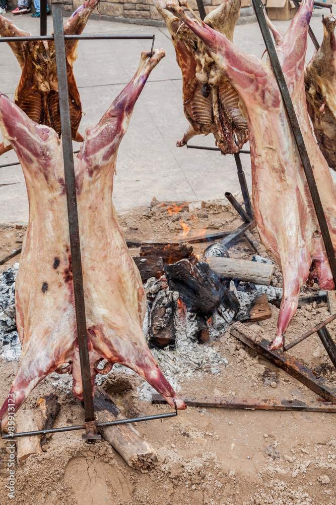 Obraz premium Traditional barbecue of a lamb in Argentina