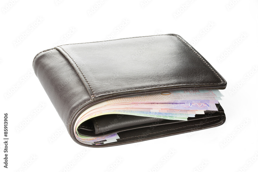 Wallet with money isolated on white background. Wallet with money isolated on white background.
