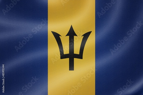 Barbados flag on the fabric texture background