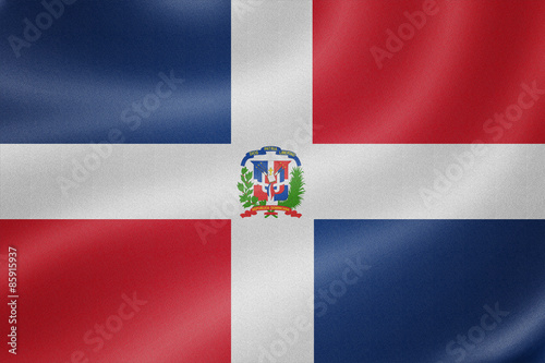 Dominican Republic flag on the fabric texture background