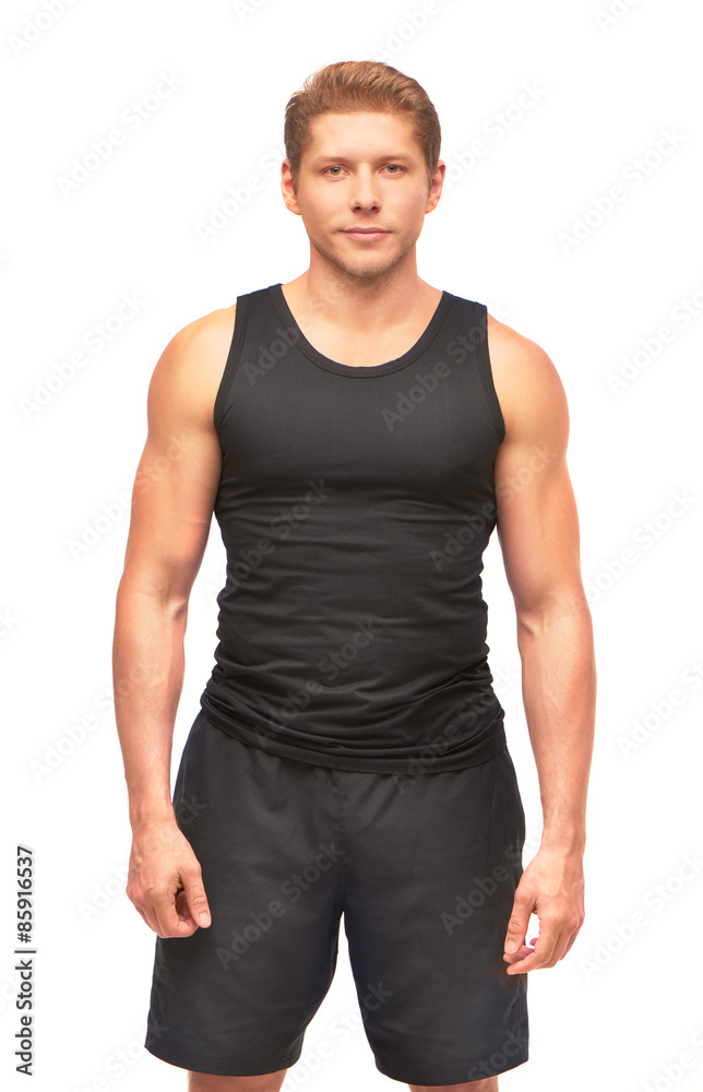 Young muscular handsome sportsman looking at camera Young muscular handsome sportsman looking at camera