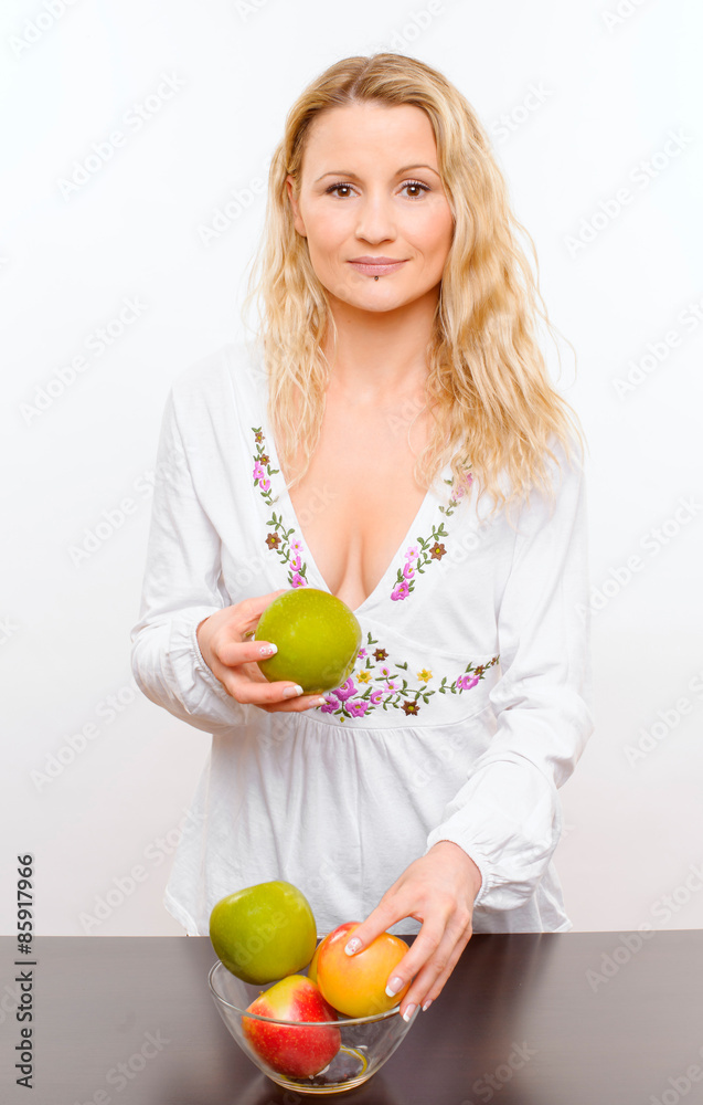 young housewife with fruit young housewife with fruit