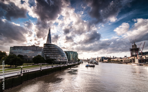 Dramatic burst of clouds above London City Hall after the storm