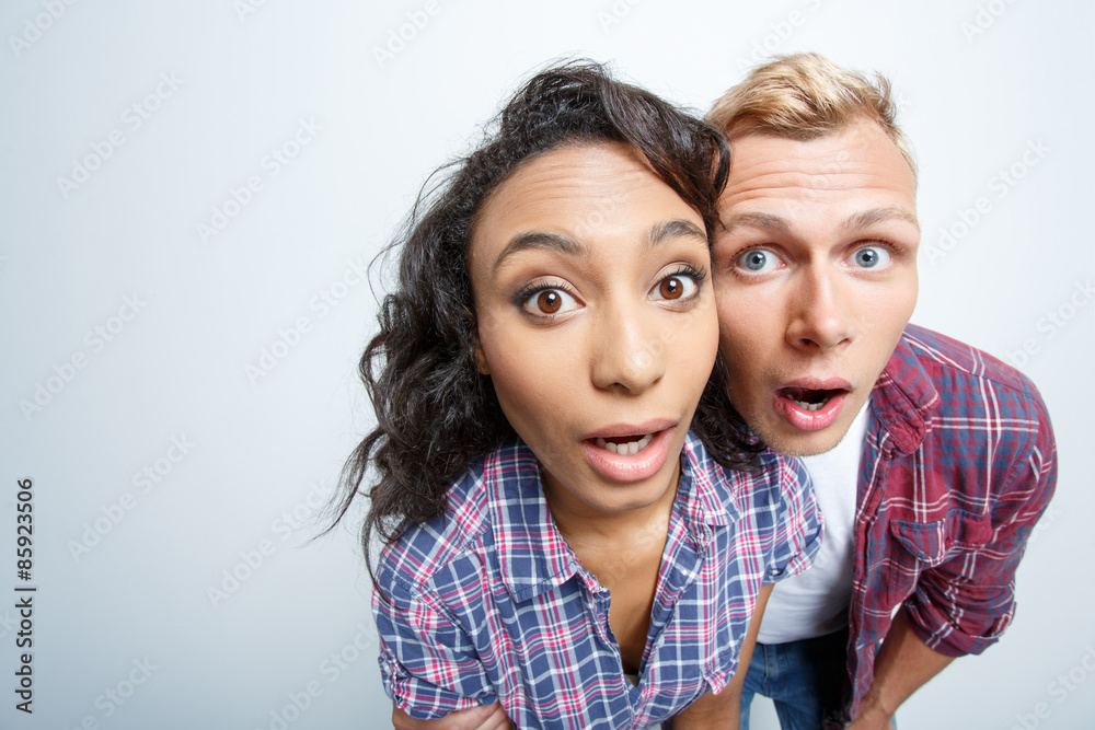 Lovely couple isolated on grey Lovely couple isolated on grey
