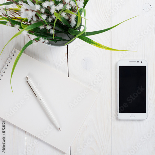 Simple workspace on wooden table
