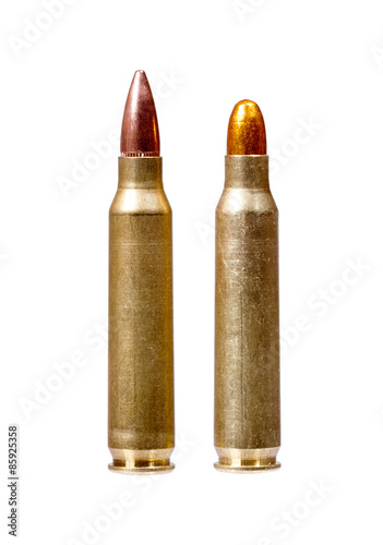 Two rifle bullets over white background.